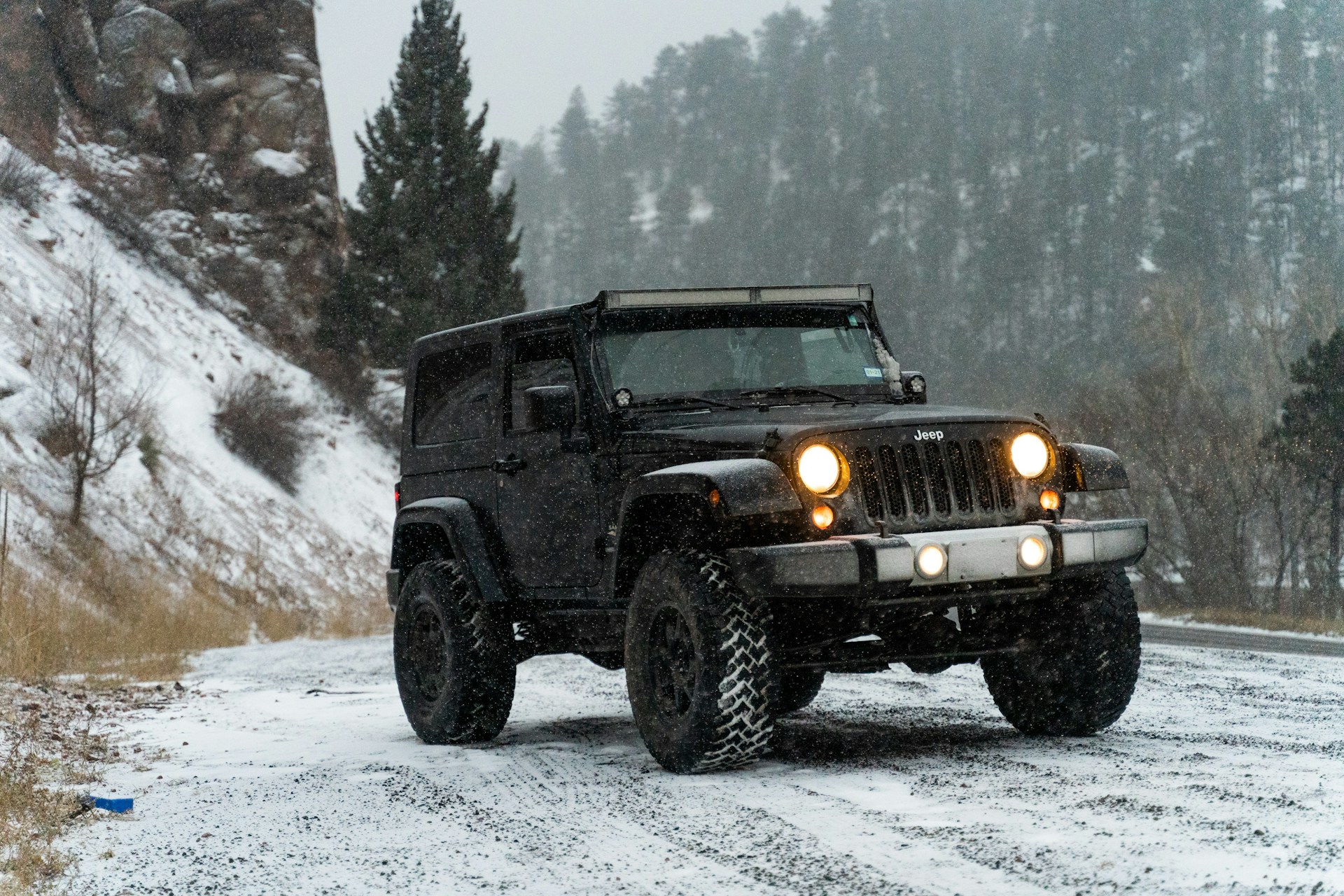 An SUV on a snowy road
