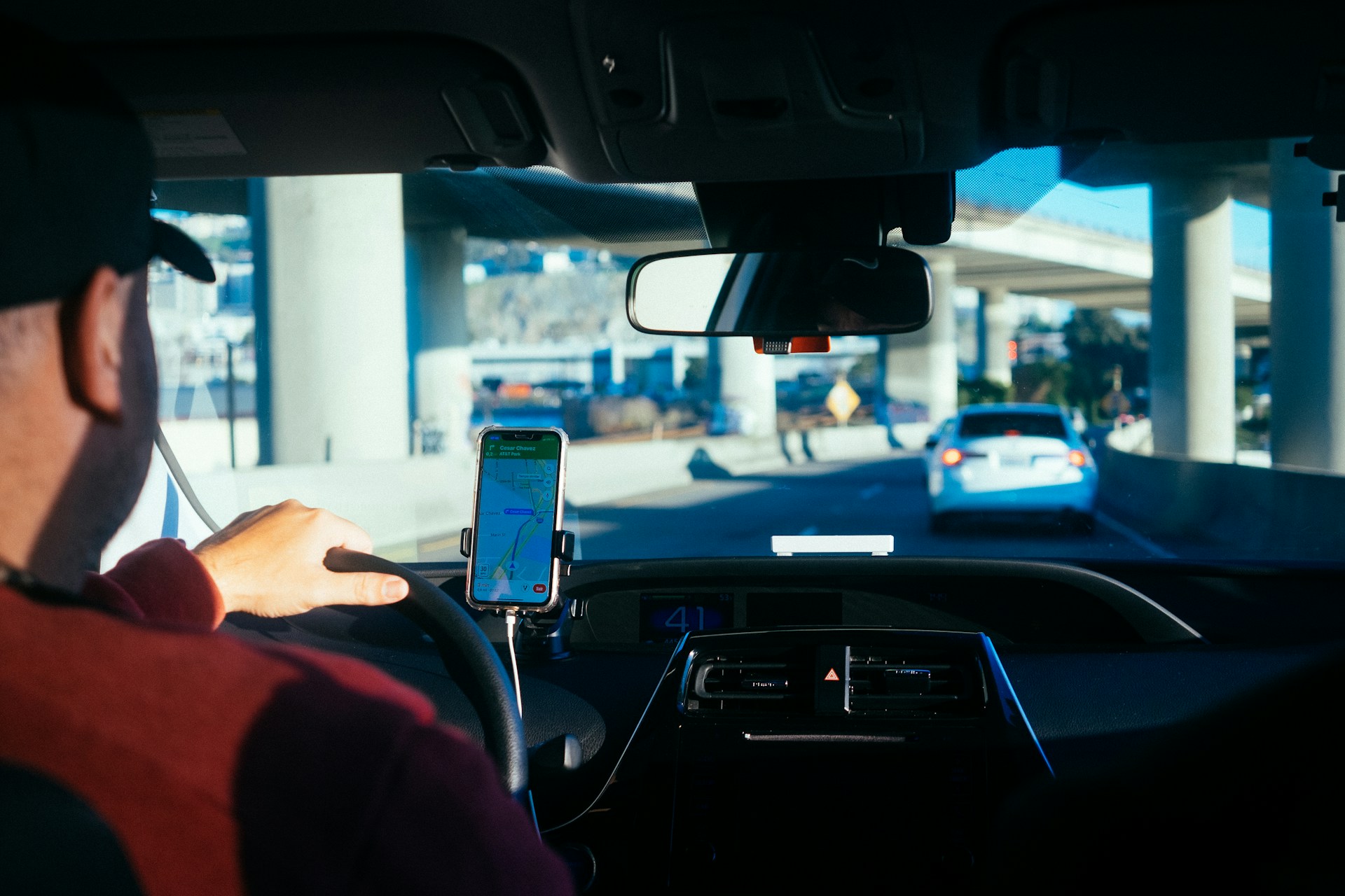 An Uber driver following a map