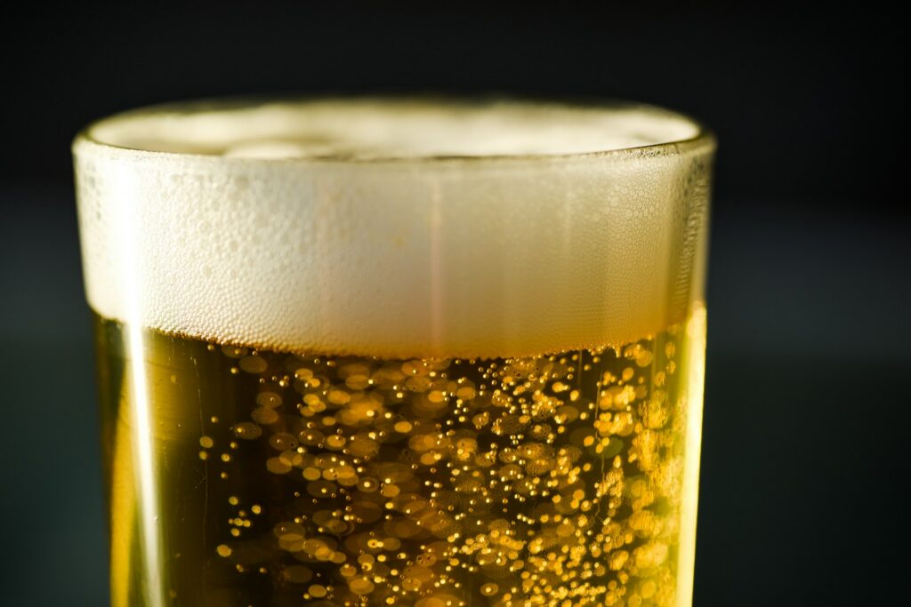 The head of a pint of lager